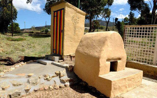 The original bread oven takes 20 loaves and was rebuilt during the restoration process. The outhouse now boasts a flush WC. The original bread oven takes 20 loaves and was rebuilt during the restoration process. The outhouse now boasts a flush WC.